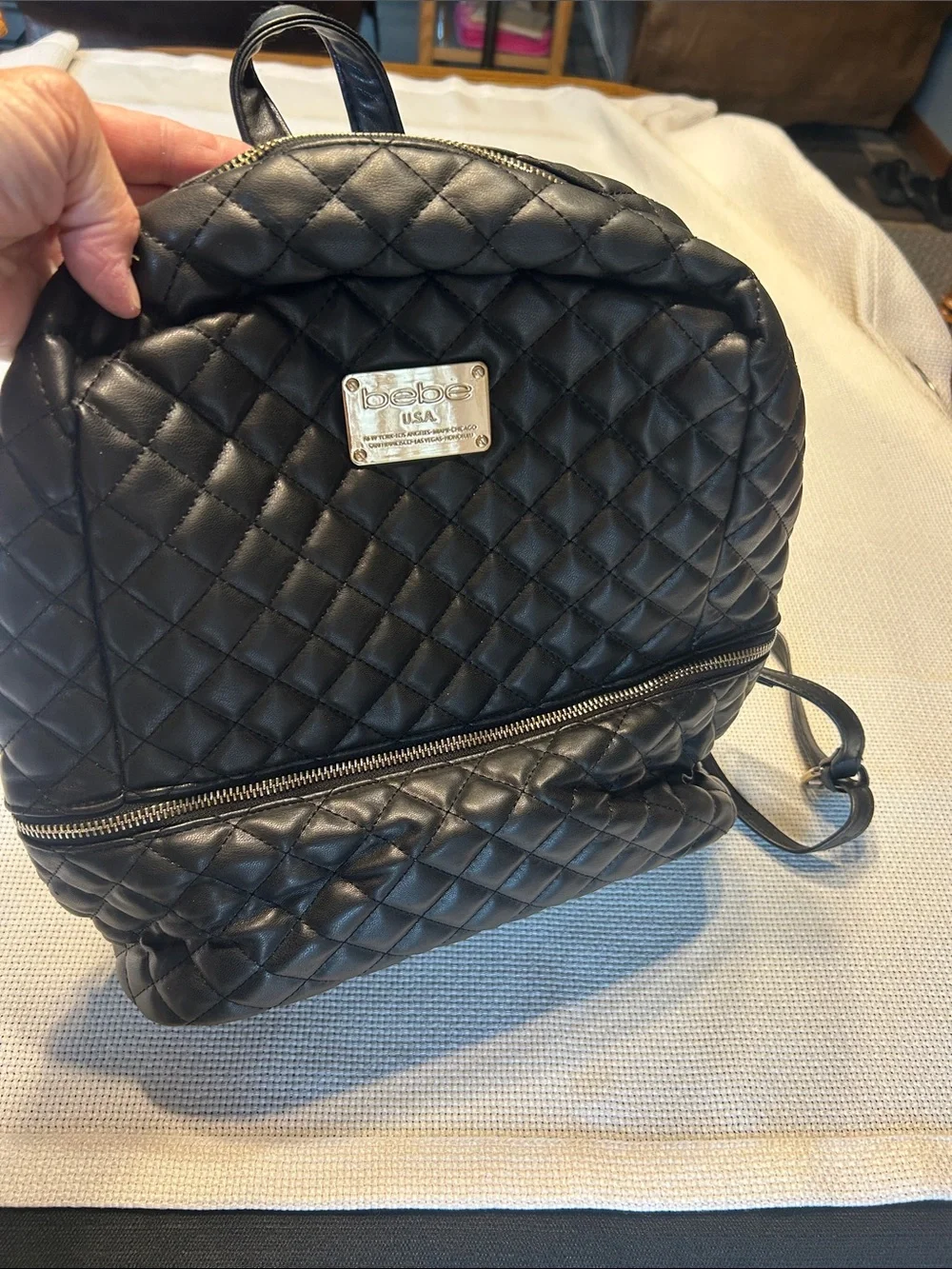 bebe Black Quilted Leather Backpack with Gold Plate